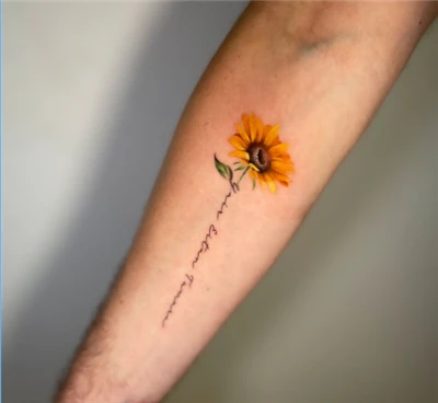 El gira-sol tatuat: una encarnació d'esperança i resiliència