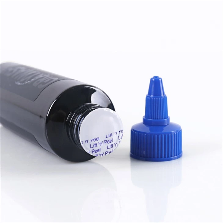 Emmagatzematge de tinta de tatuatge Tinta de tatuatge amb guspira de rentat gris